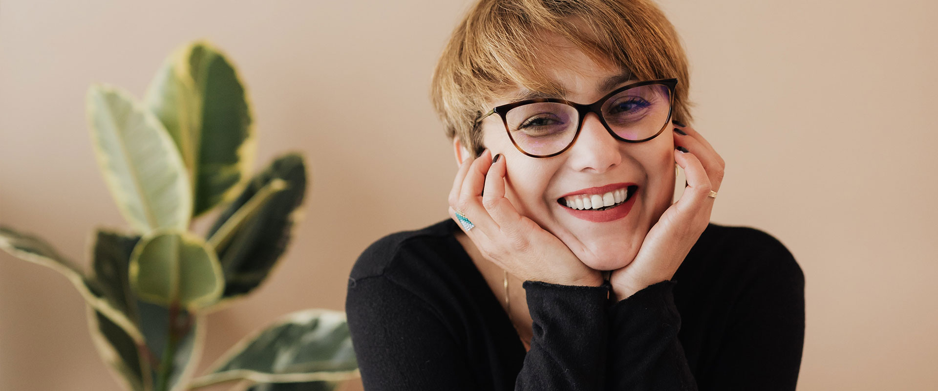 Woman with Glasses Smiling